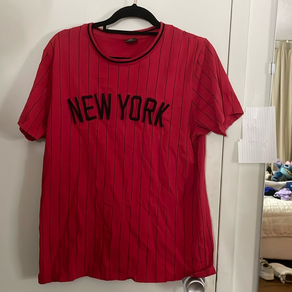 Red shirt that’s says New York